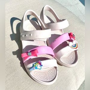 Girls Crocs sandals. Size 13,fit 6-8yo. Light pink color, shoe pins
